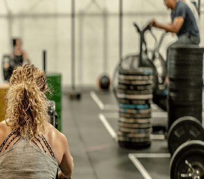 A coached group class on the floor at Isabella Fitness